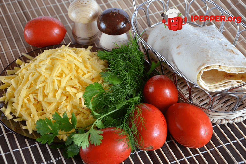 Описание рецепта Горячие рулеты из лаваша с помидорами и сыром