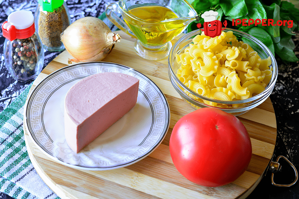 Описание рецепта Макароны с помидорами и колбасой на сковороде
